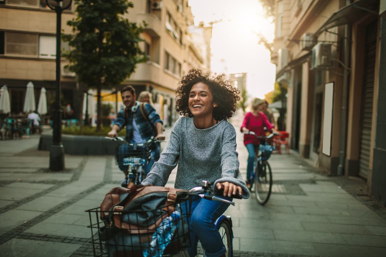 Group of young people exploring the city on bicycle.